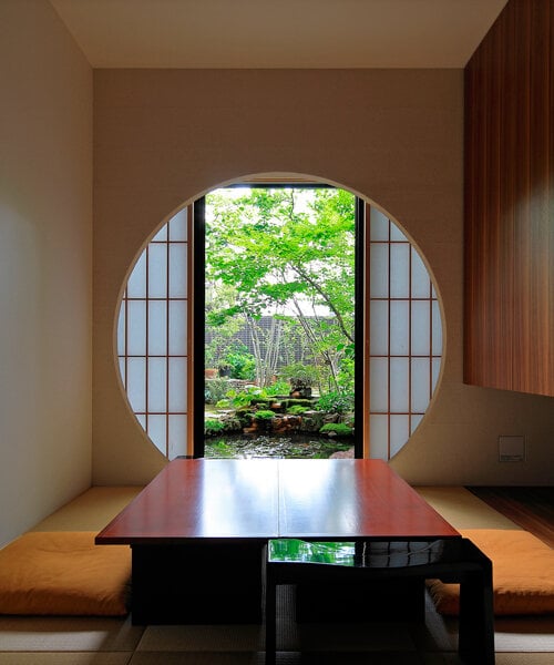 open courtyards embed natural greenery within the living spaces of residence in japan
