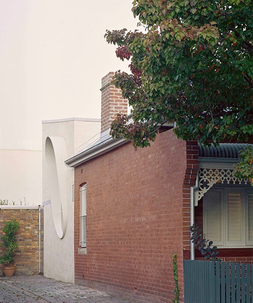 pandolfini architects adds bold extension to modest victorian terrace house in melbourne